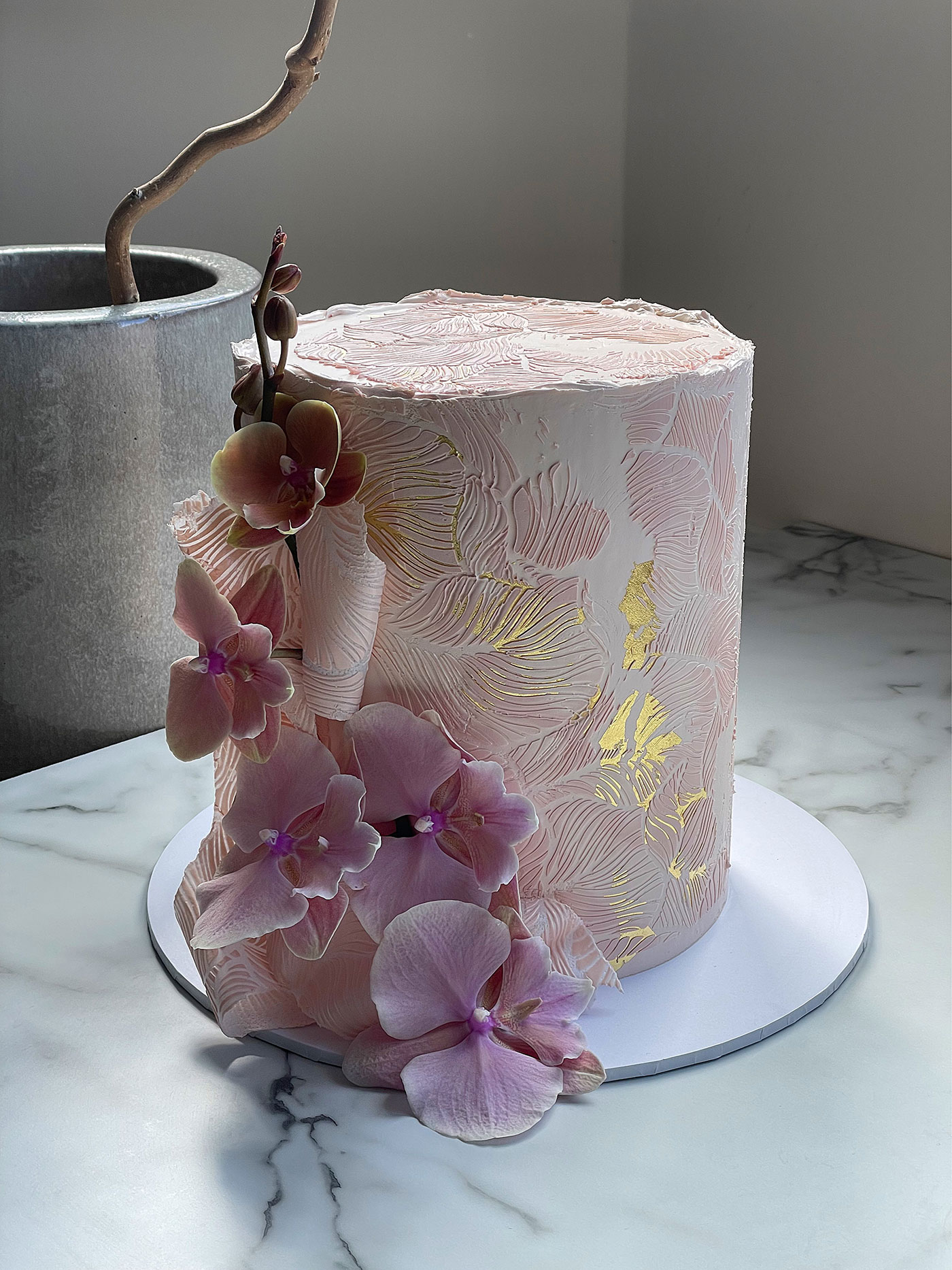 Pink celebration cake with flowers Pink wedding cake with flowers